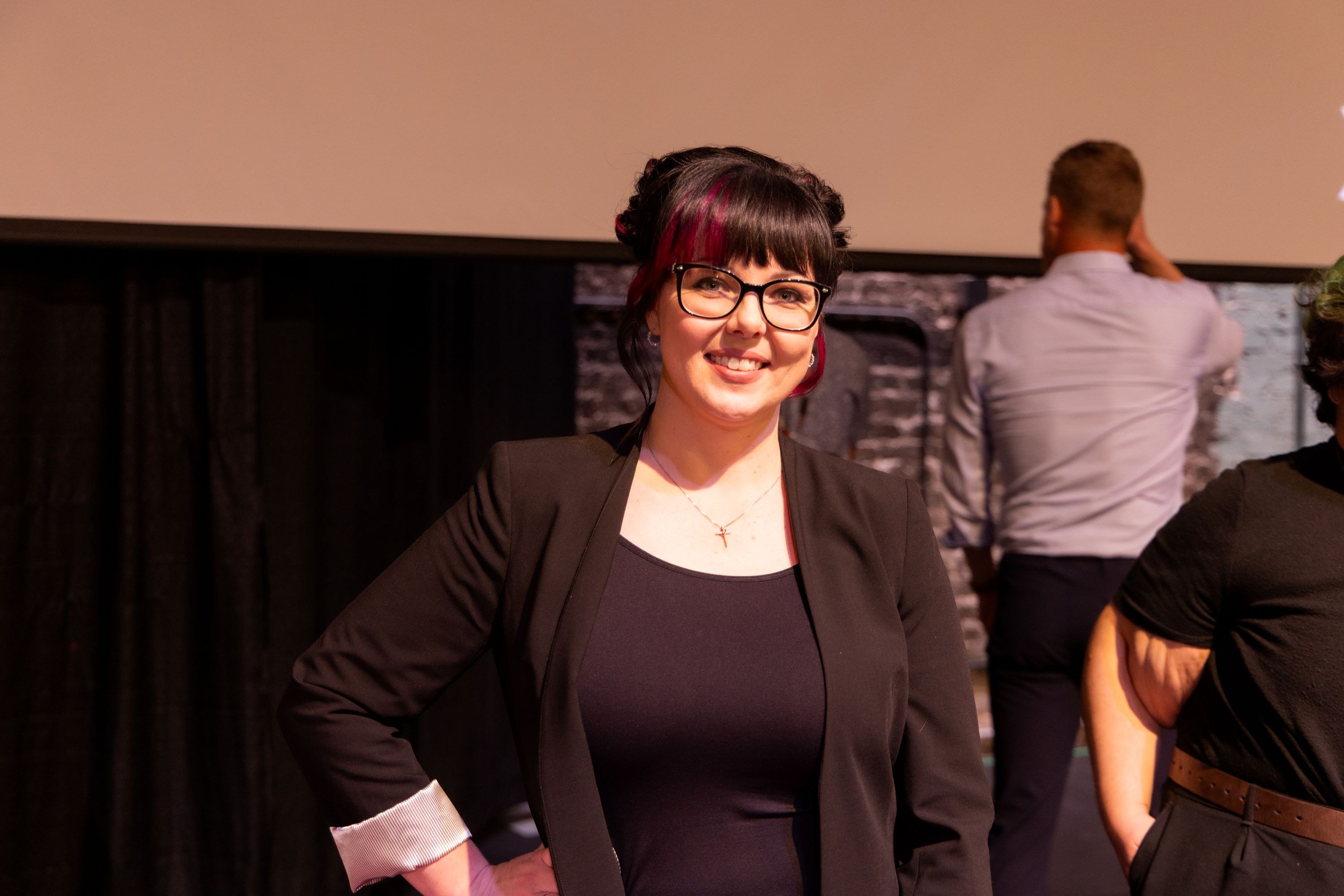 Lyndsay Wisneski delivering her TEDx Talk, April 2025